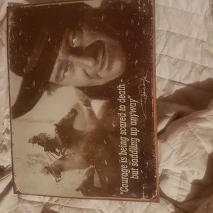 Tin poster of John Wayne